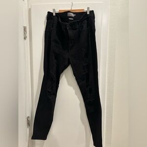 Sleek Black Distressed Skinny Jeans